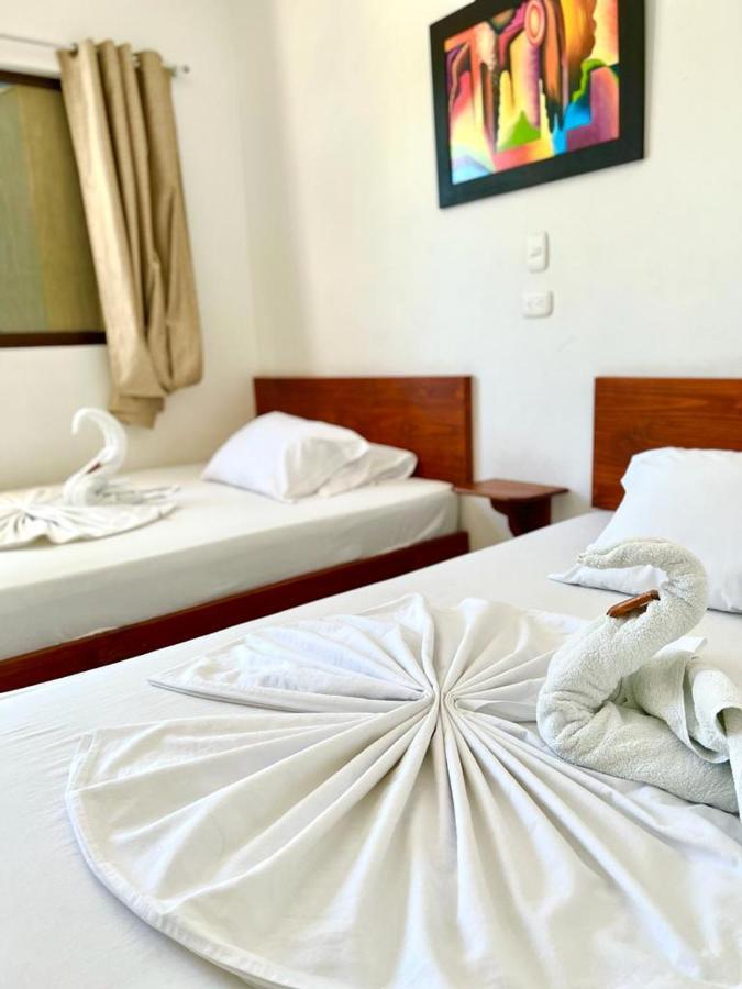 Hotel Paraiso Plaza Puerto Triunfo Bagian luar foto