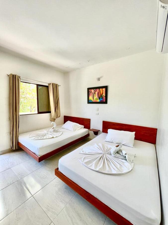 Hotel Paraiso Plaza Puerto Triunfo Bagian luar foto