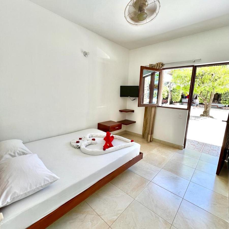 Hotel Paraiso Plaza Puerto Triunfo Bagian luar foto