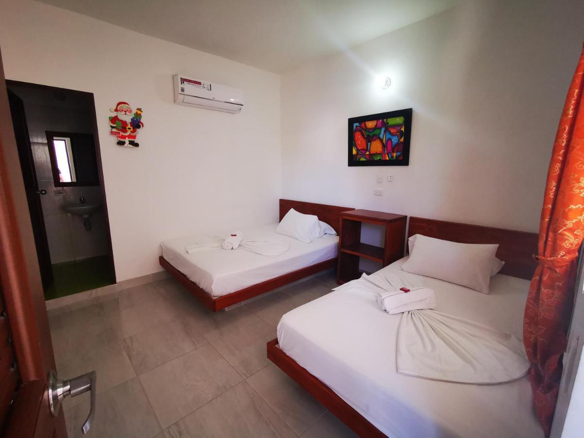 Hotel Paraiso Plaza Puerto Triunfo Bagian luar foto