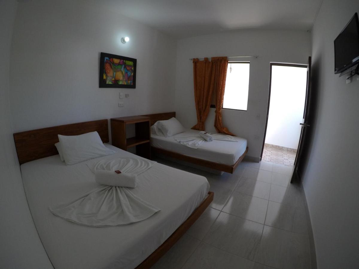 Hotel Paraiso Plaza Puerto Triunfo Bagian luar foto