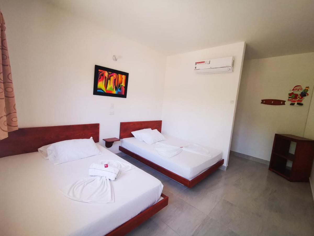 Hotel Paraiso Plaza Puerto Triunfo Bagian luar foto