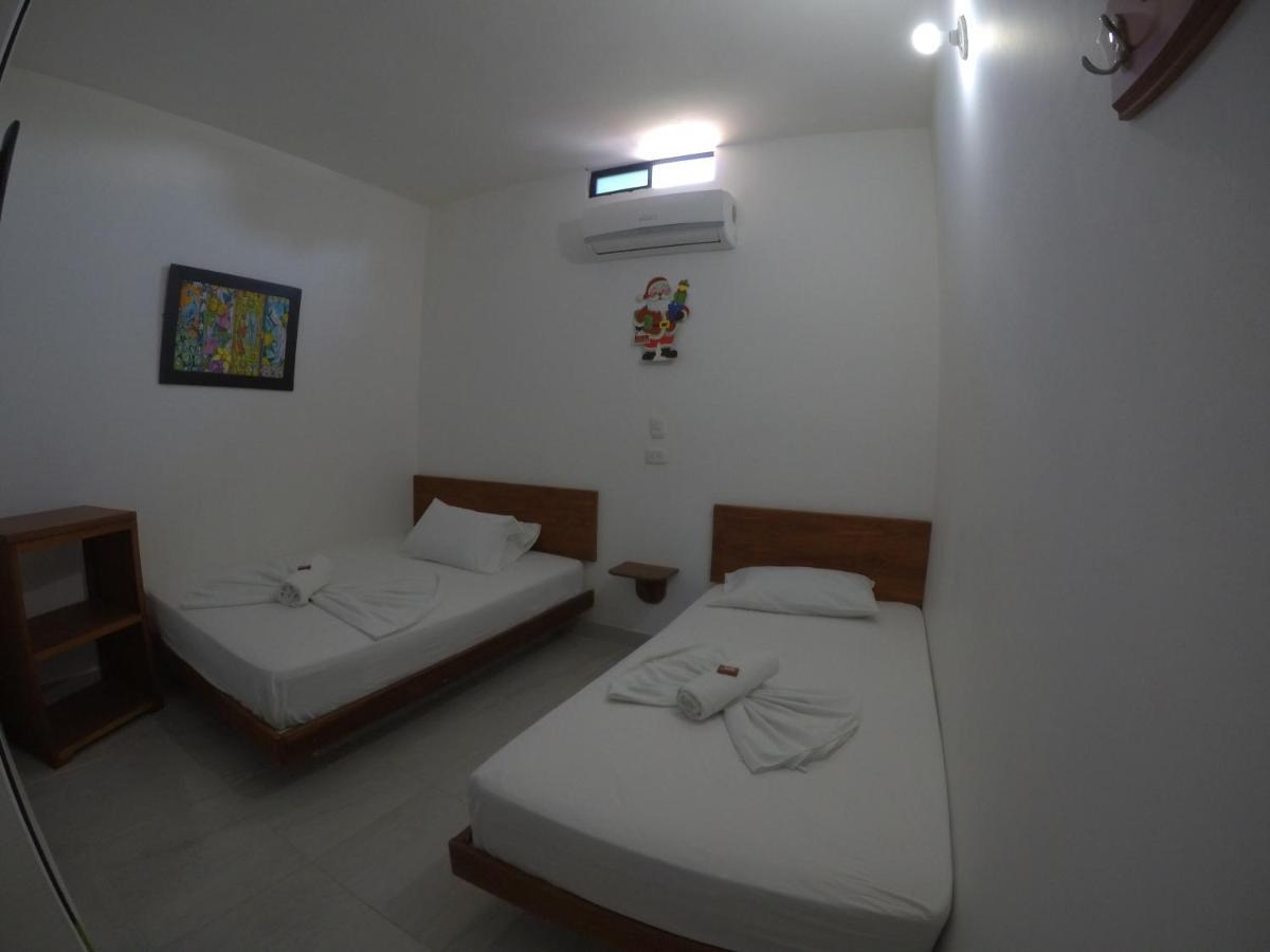 Hotel Paraiso Plaza Puerto Triunfo Bagian luar foto